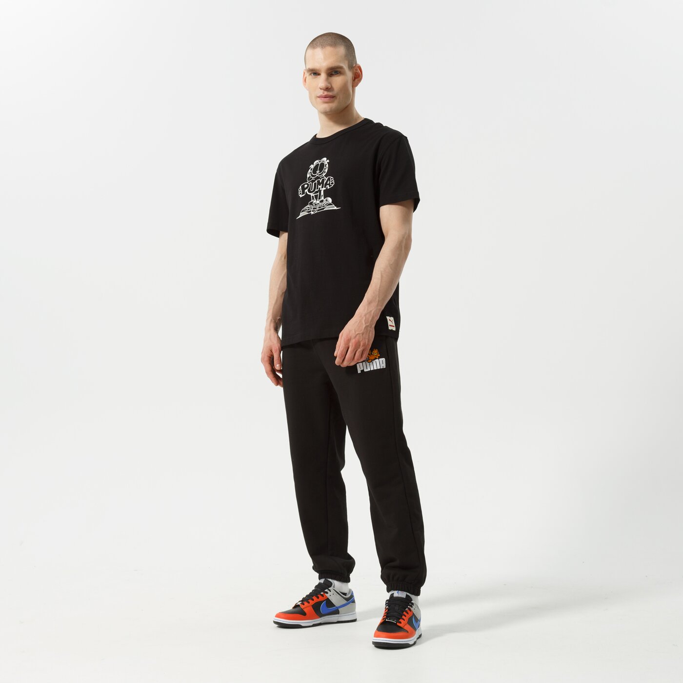 Мъжки панталони PUMA ПАНТАЛОНИ PUMA X GARFIELD SWEATPANTS 534436 01 цвят черен