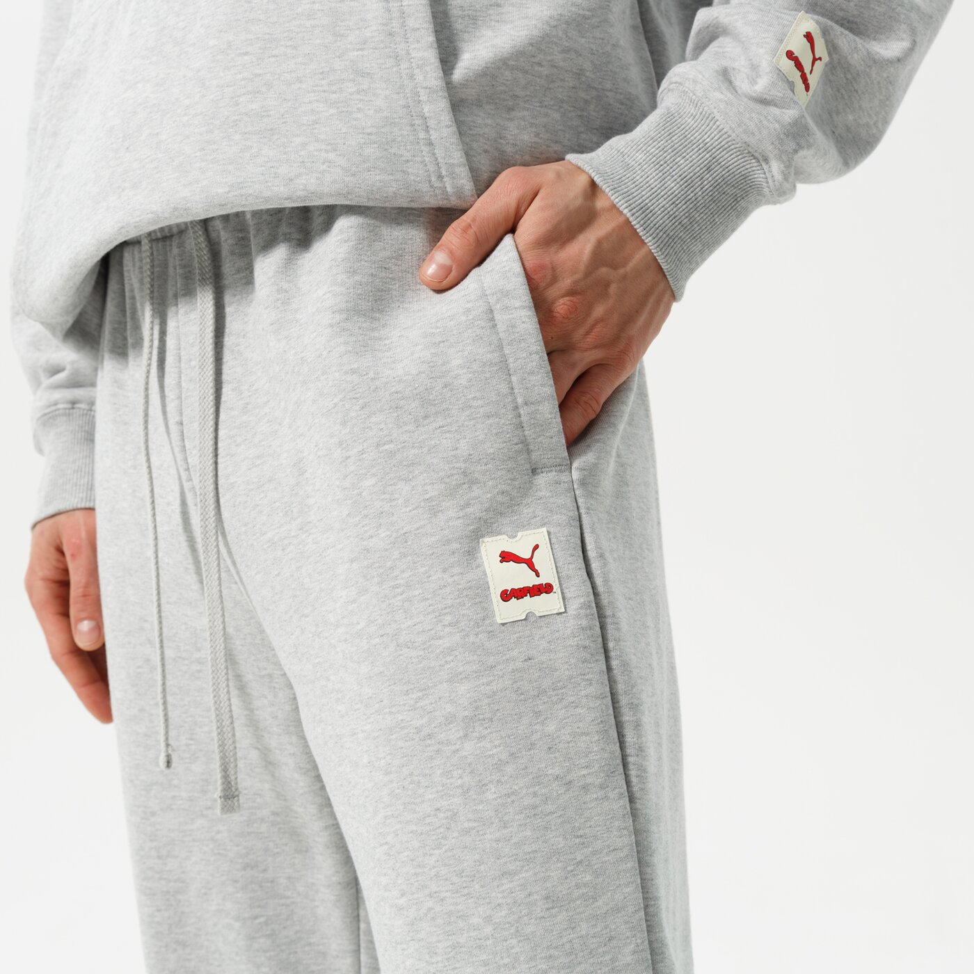 Мъжки панталони PUMA ПАНТАЛОНИ PUMA X GARFIELD SWEATPANTS 534436 04 цвят сив