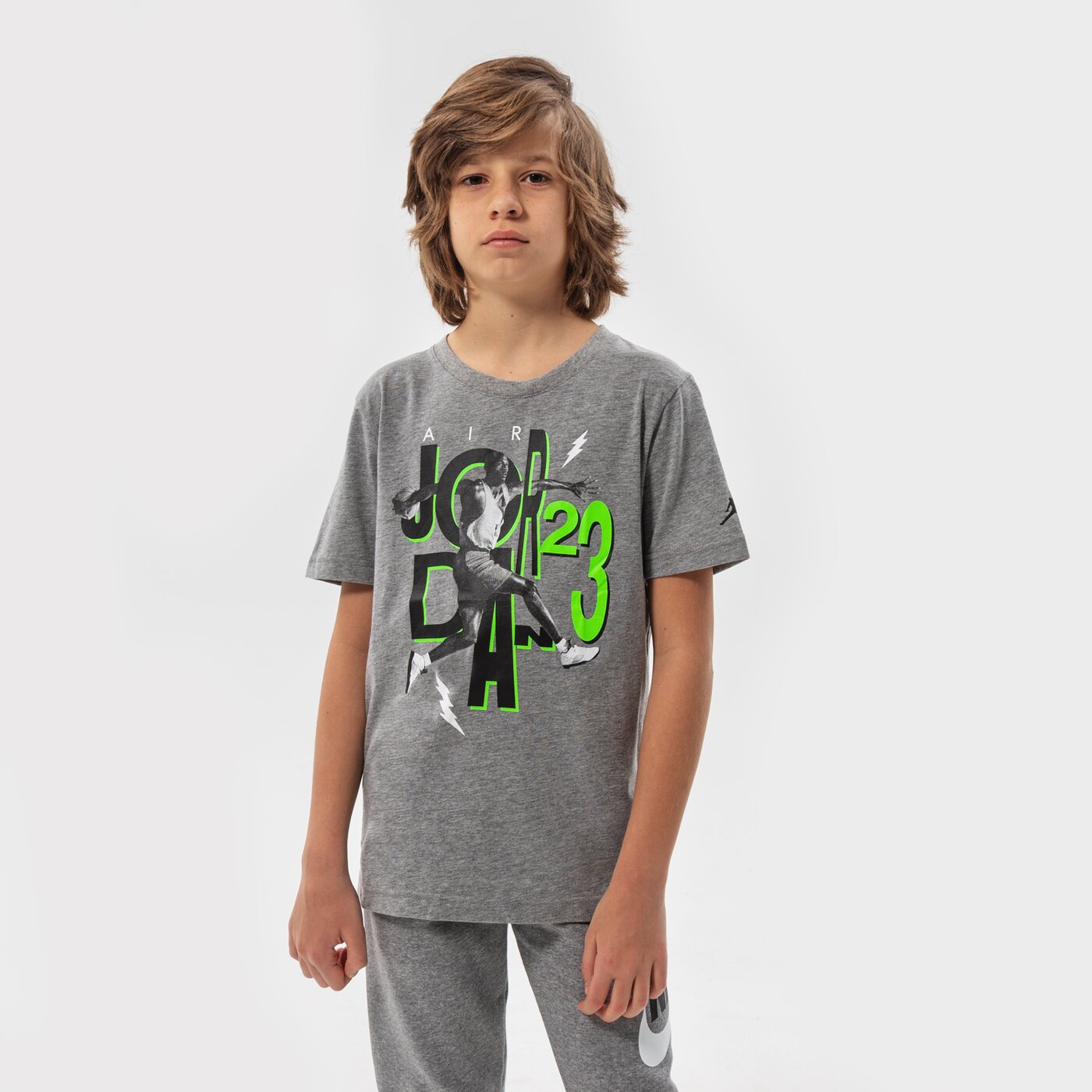 Детска тениска JORDAN ТЕНИСКА JUMBLE AIR TIME SS TEE BOY 95b238-geh цвят сив