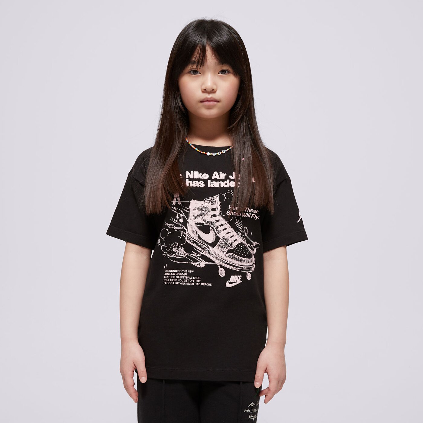 Детска тениска JORDAN ТЕНИСКА JDG W J SS OS GFX TEE GIRL 45d645-023 цвят черен