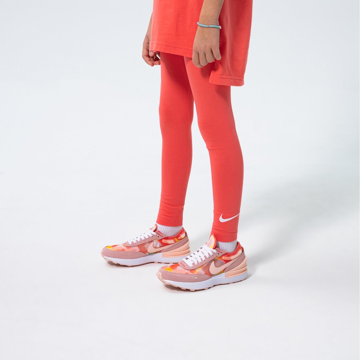 Детски панталони NIKE КЛИН G NSW FAVORITES SWSH LGGNG LBR G GIRL dd6482-814 цвят розов
