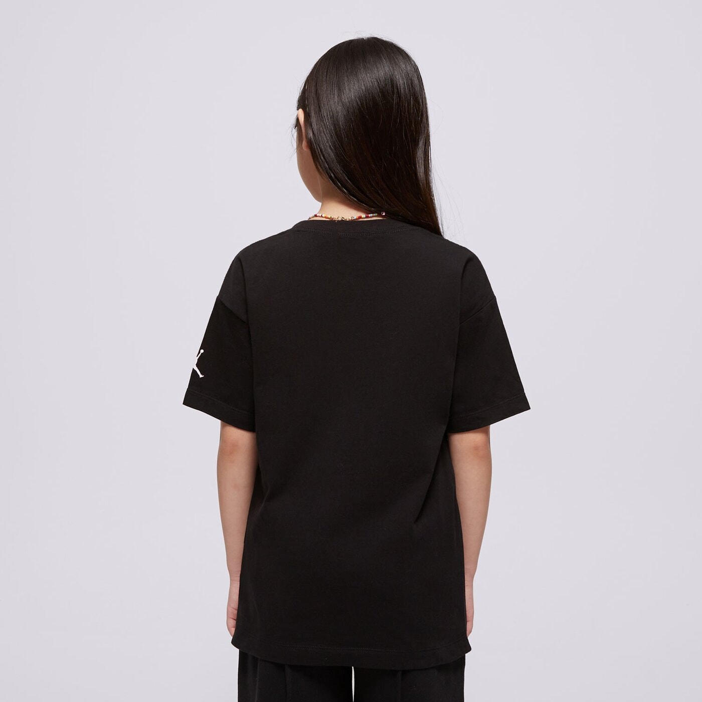 Детска тениска JORDAN ТЕНИСКА JDG W J SS OS GFX TEE GIRL 45d645-023 цвят черен