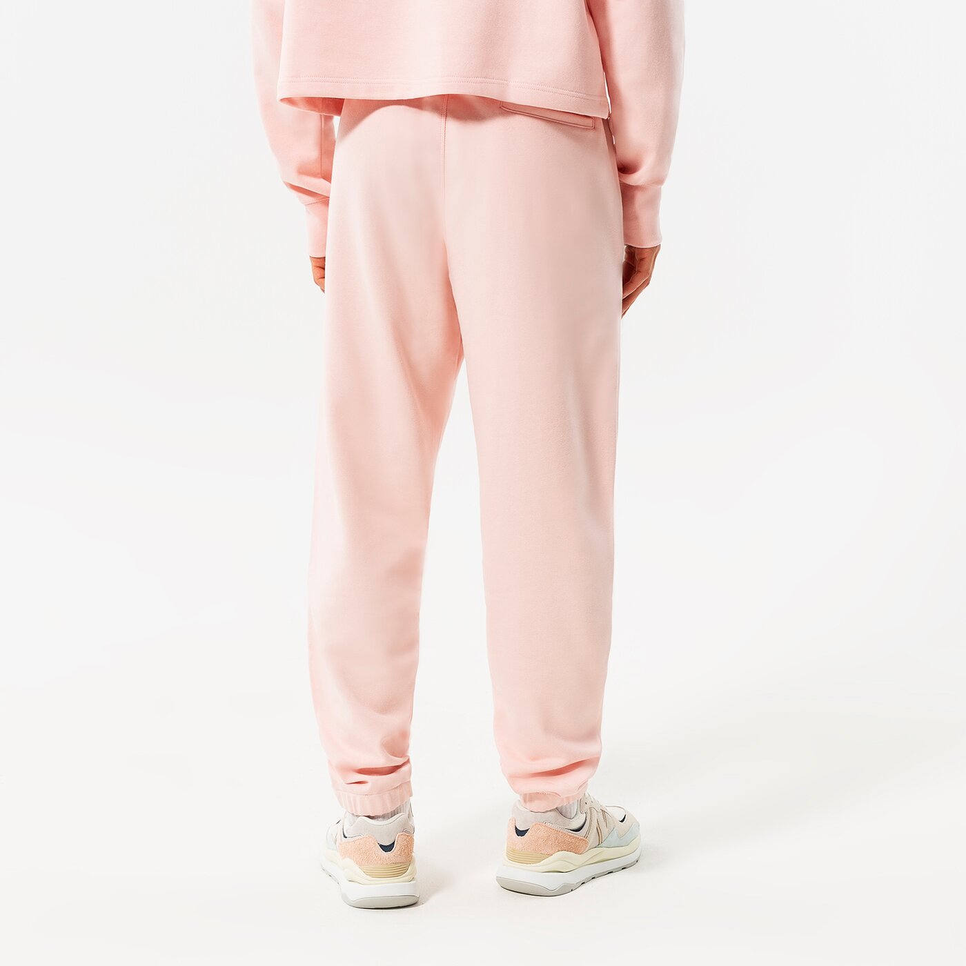 Дамски панталони NEW BALANCE ПАНТАЛОНИ NB ESSENTIALS UNI-SSENTIALS SWEATPANT up21500pie цвят розов