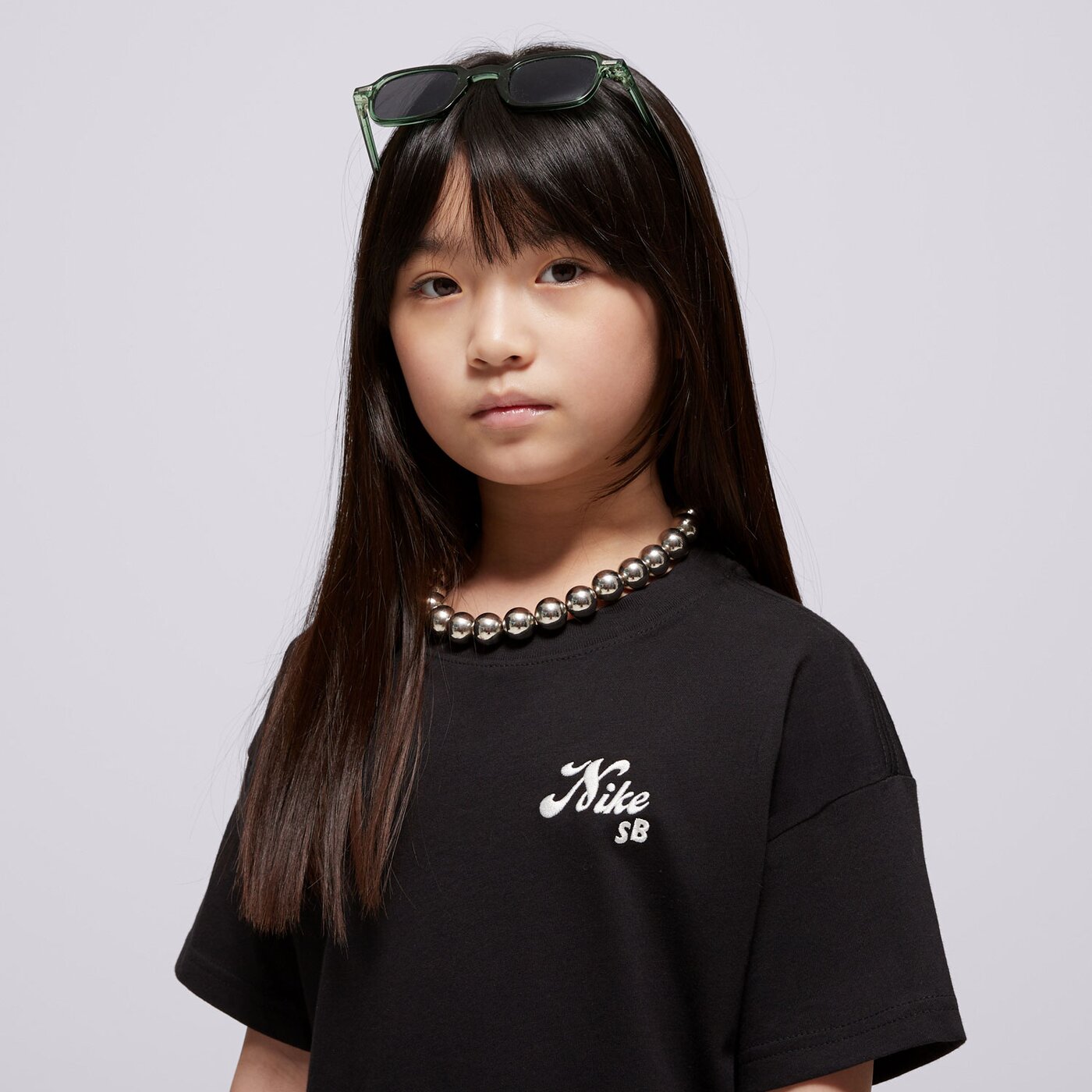 Детска тениска NIKE ТЕНИСКА G NK SB TEE BOXY GIRL hm6312-010 цвят черен