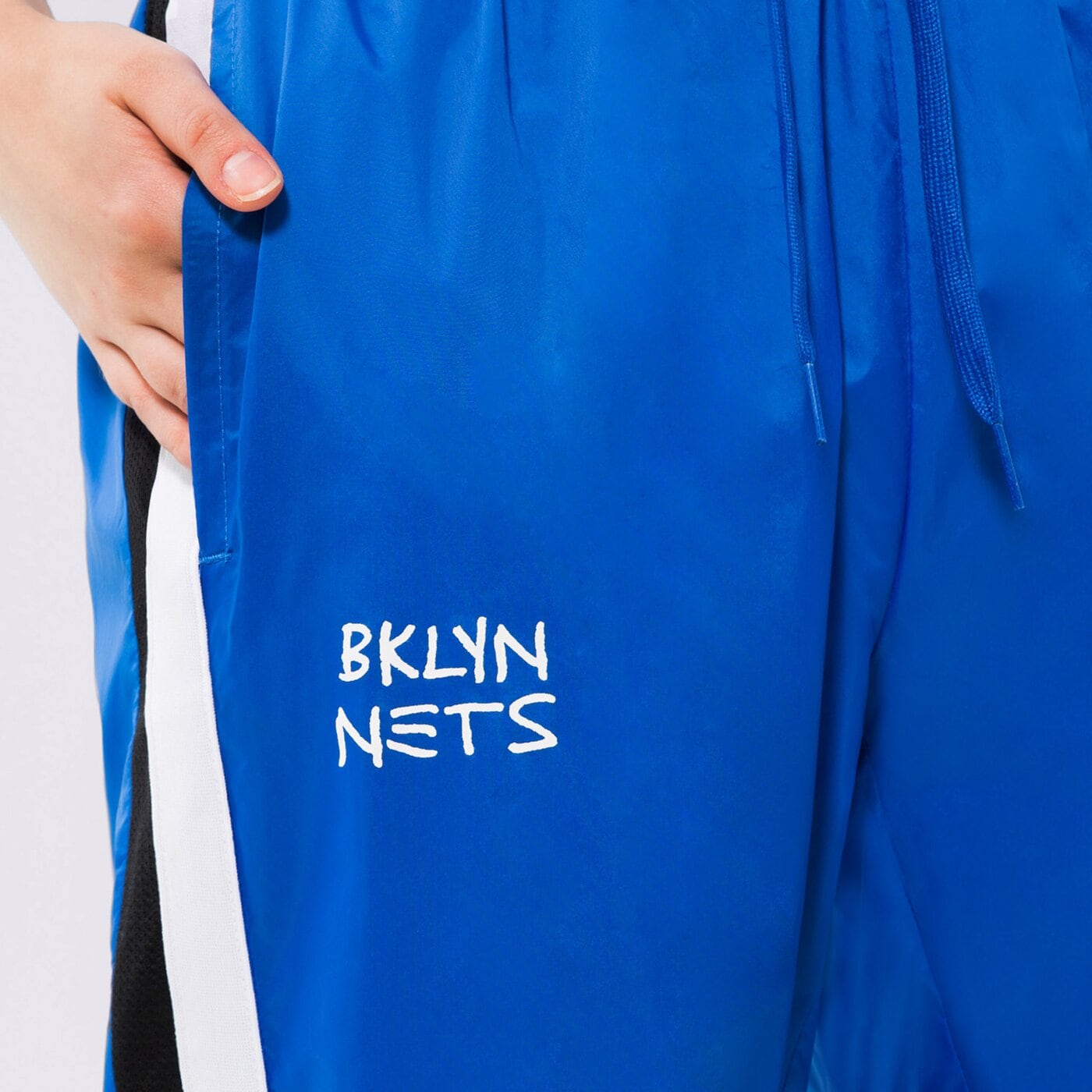 Дамски панталони NIKE ПАНТАЛОНИ BKN W NK TRKST PANT CTS CE NBA do0129-463 цвят син