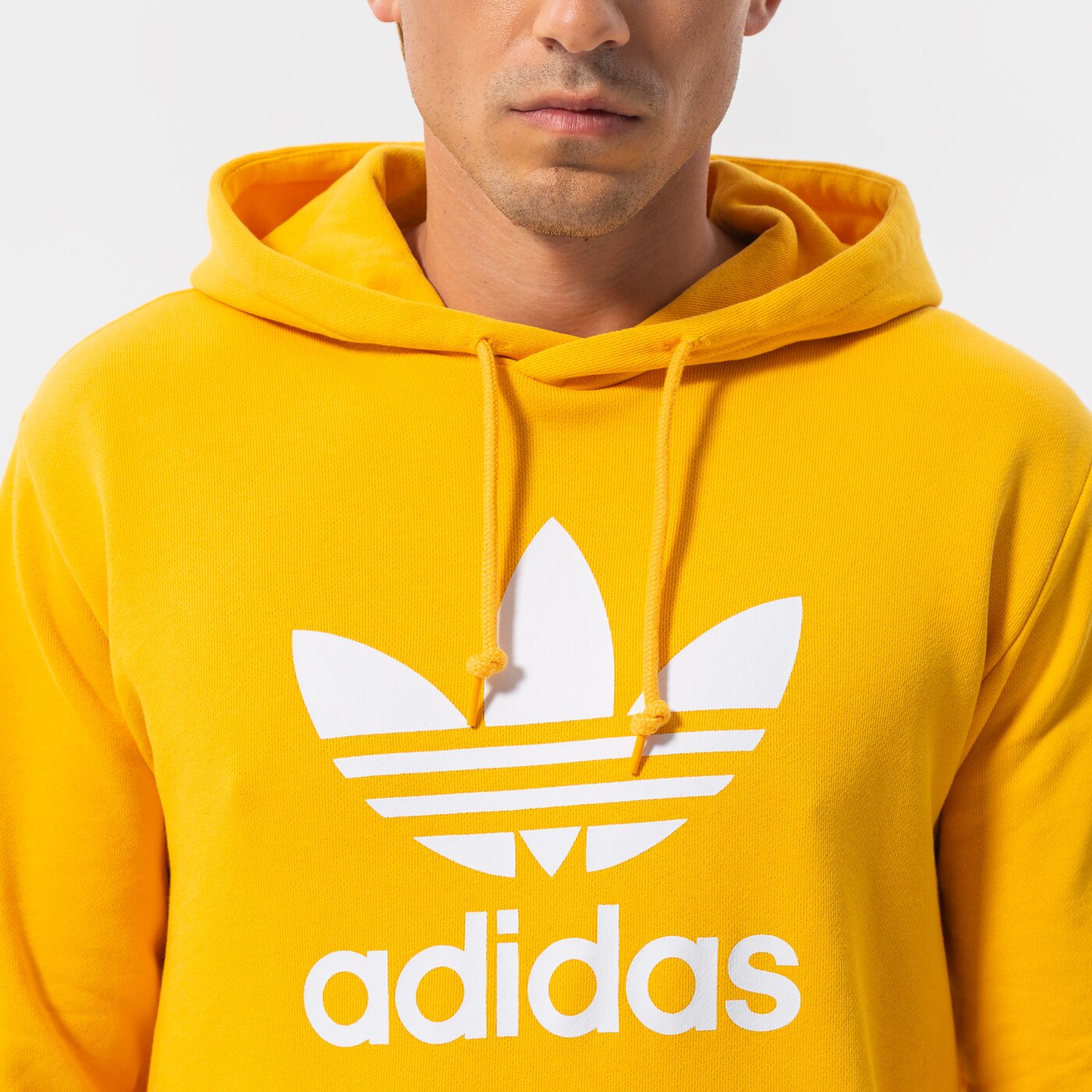 Мъжки суичър ADIDAS СУИТЧЪР С КАЧУЛКА TREFOIL HOODY he9499 цвят жълт
