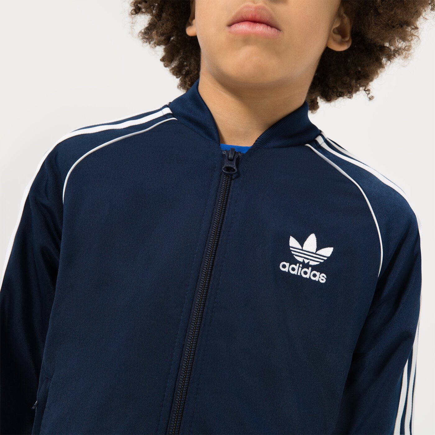 Детски суичър ADIDAS СУИТЧЪР СЪС ЗАКОПЧАВАНЕ SST TRACK ТОП BOY hk0298 цвят тъмносин