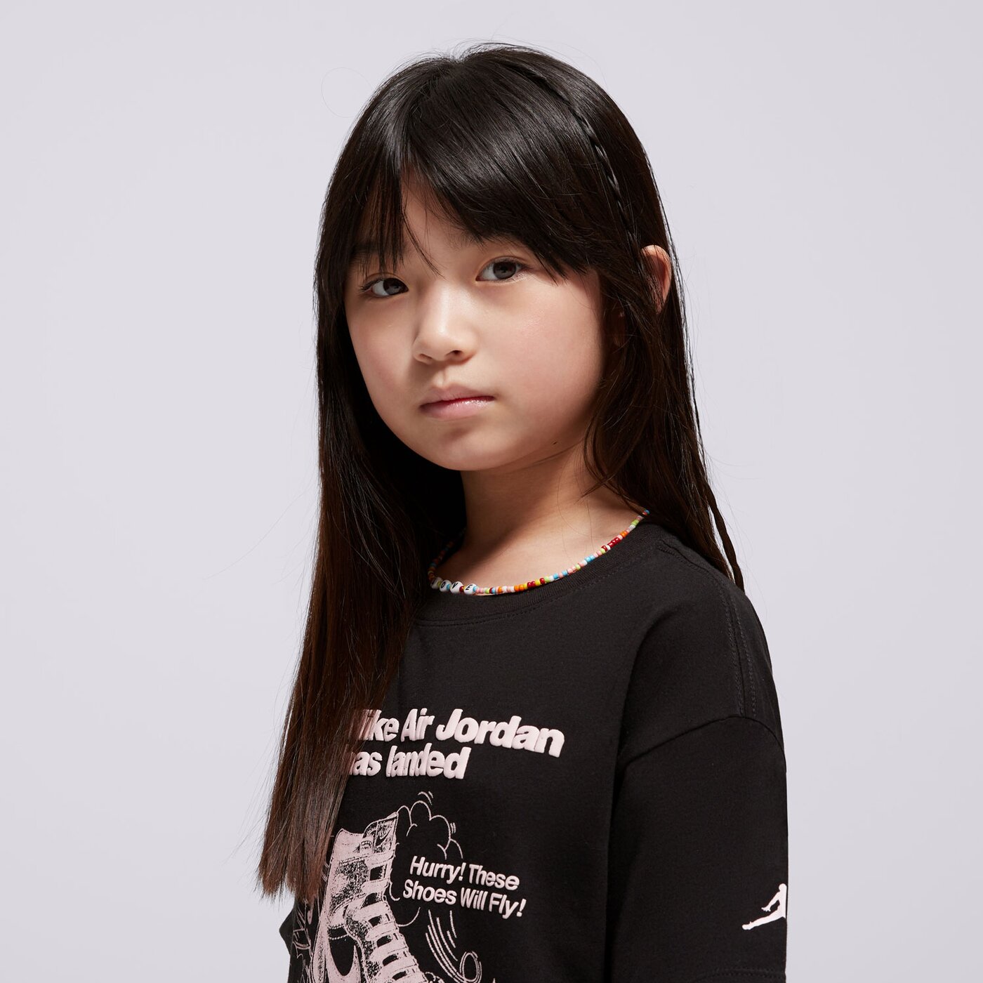 Детска тениска JORDAN ТЕНИСКА JDG W J SS OS GFX TEE GIRL 45d645-023 цвят черен