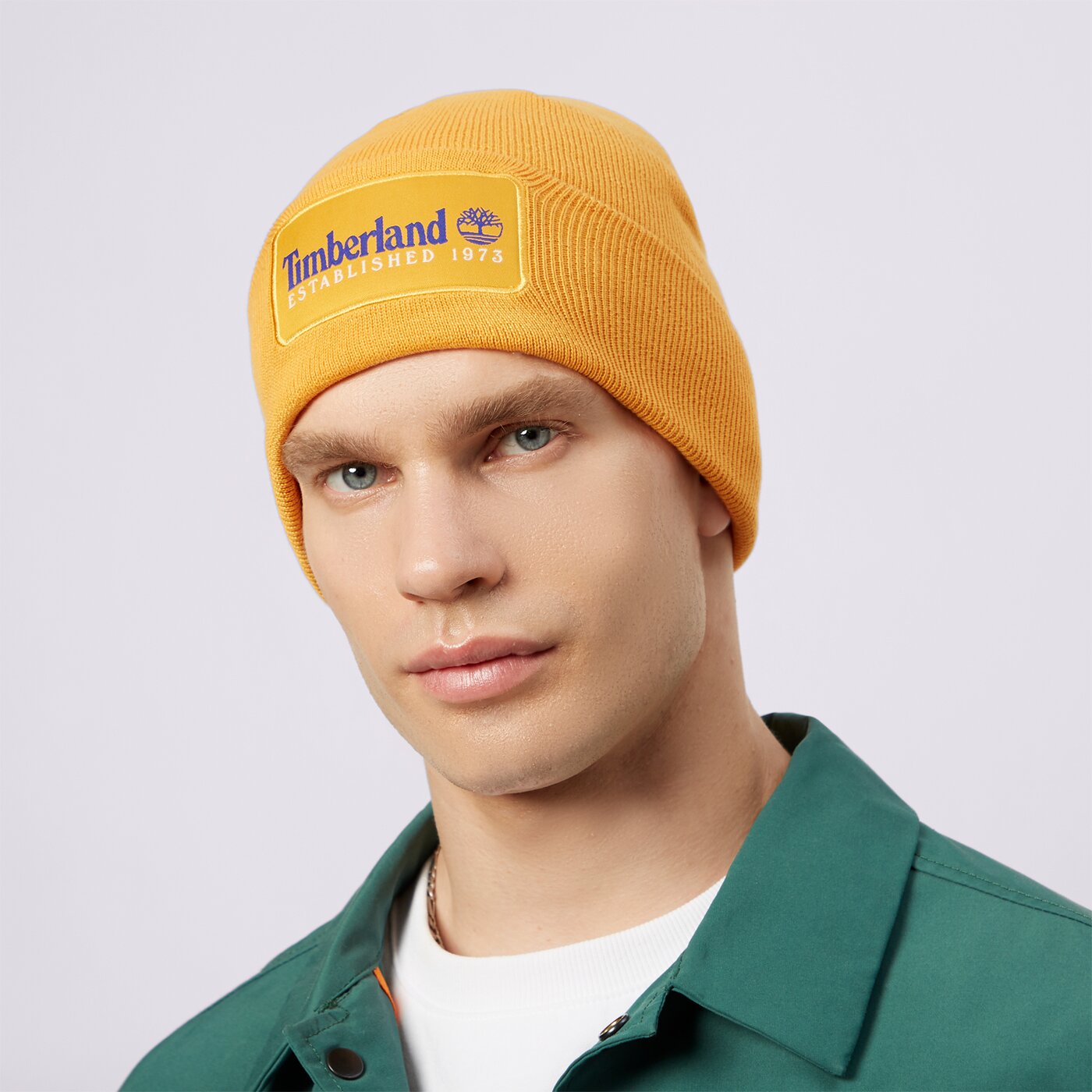 Дамска зимна шапка TIMBERLAND ШАПКА ESTABLISHED 1973 tb0a2ptd8041 цвят жълт