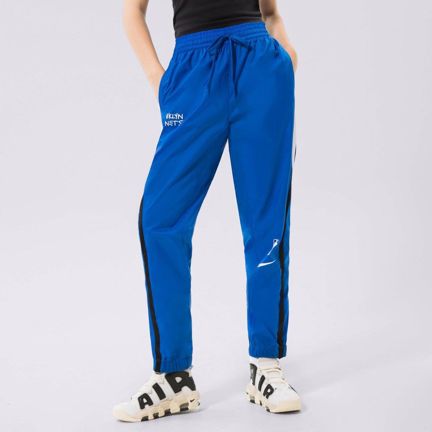 Дамски панталони NIKE ПАНТАЛОНИ BKN W NK TRKST PANT CTS CE NBA do0129-463 цвят син