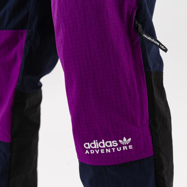 Мъжки панталони ADIDAS ПАНТАЛОНИ WOVEN PANTS h09051 цвят виолетов